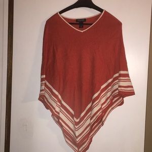 Orange and white poncho